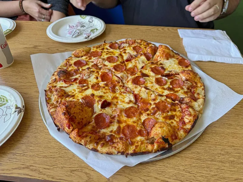 a pepperoni and cheese pizza from Funspot