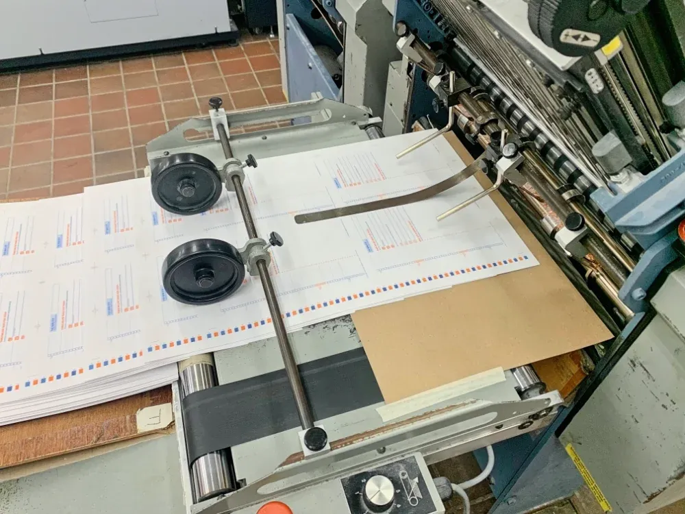 Printed pages coming out of the Heidelberg press (full size image)