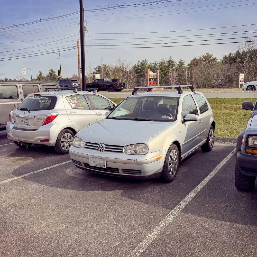 A 2000 GTI Mk4 in a mechanic's parking lot (full size image)
